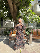 Leaves dress in black