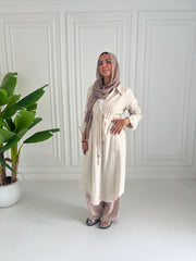 strapped beige shirt