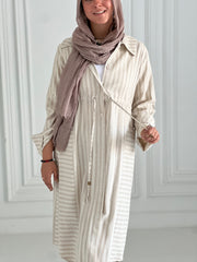 strapped beige shirt
